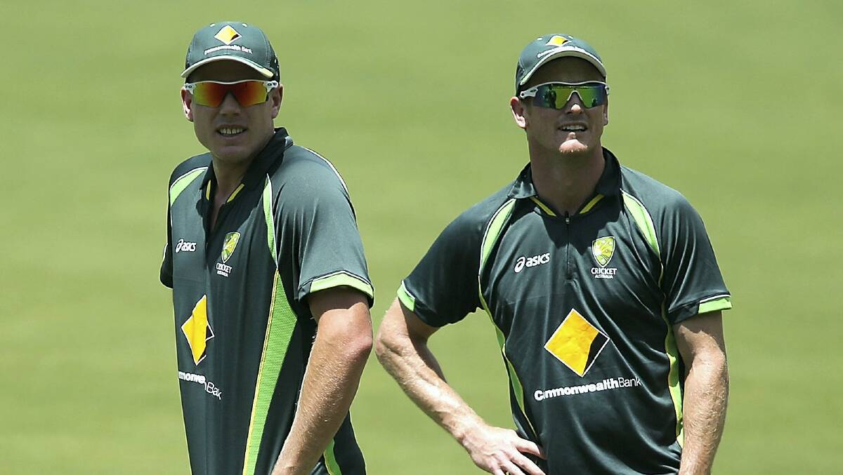 Tasmanians James Faulkner and George Bailey ahead of today's fifth Ashes Test.  Picture: Getty Images.