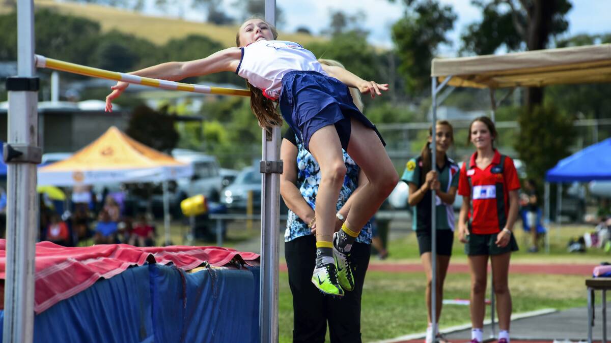 South Launceston under-13 high jumper Arabella Phillips competes at the titles at the weekend. Picture: PHILLIP BIGGS