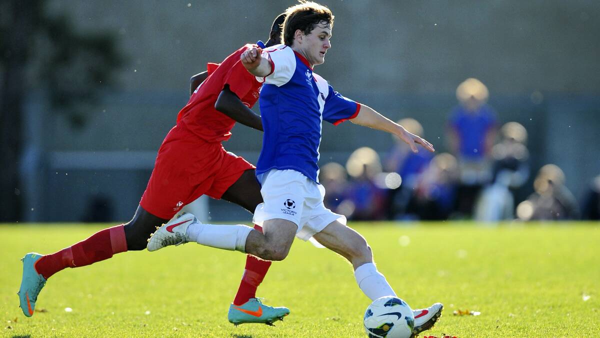 Rangers player Pat Lanau-Atkinson stays ahead of his opponent in a Victory League match from 2013.