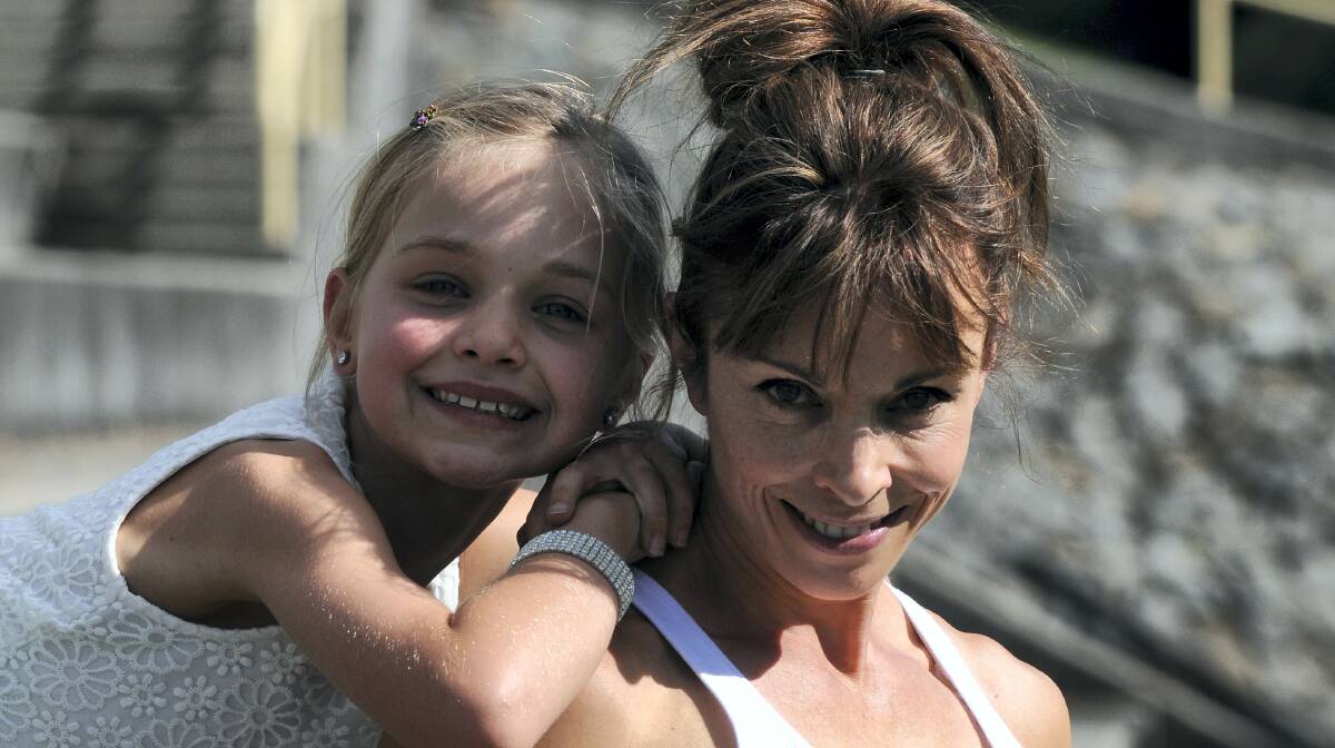 Bridget Freeman and her daughter, Jade, 9, of Launceston. Mrs Freeman was crowned the World Champion in the Physique Masters Division at the Natural Olympia in San Diego. Picture: PAUL SCAMBLER