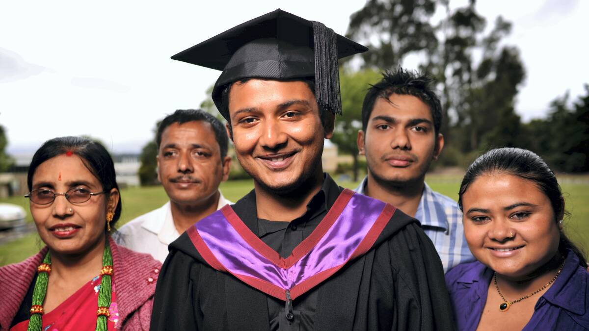 Australian Maritime College graduand Jyoti Bhandari with his parents Deuki and Thagu, brother Tulsi and wife Ganga . 