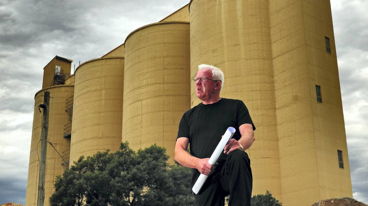 Errol Stewart in front of the old Invermay grain silos.