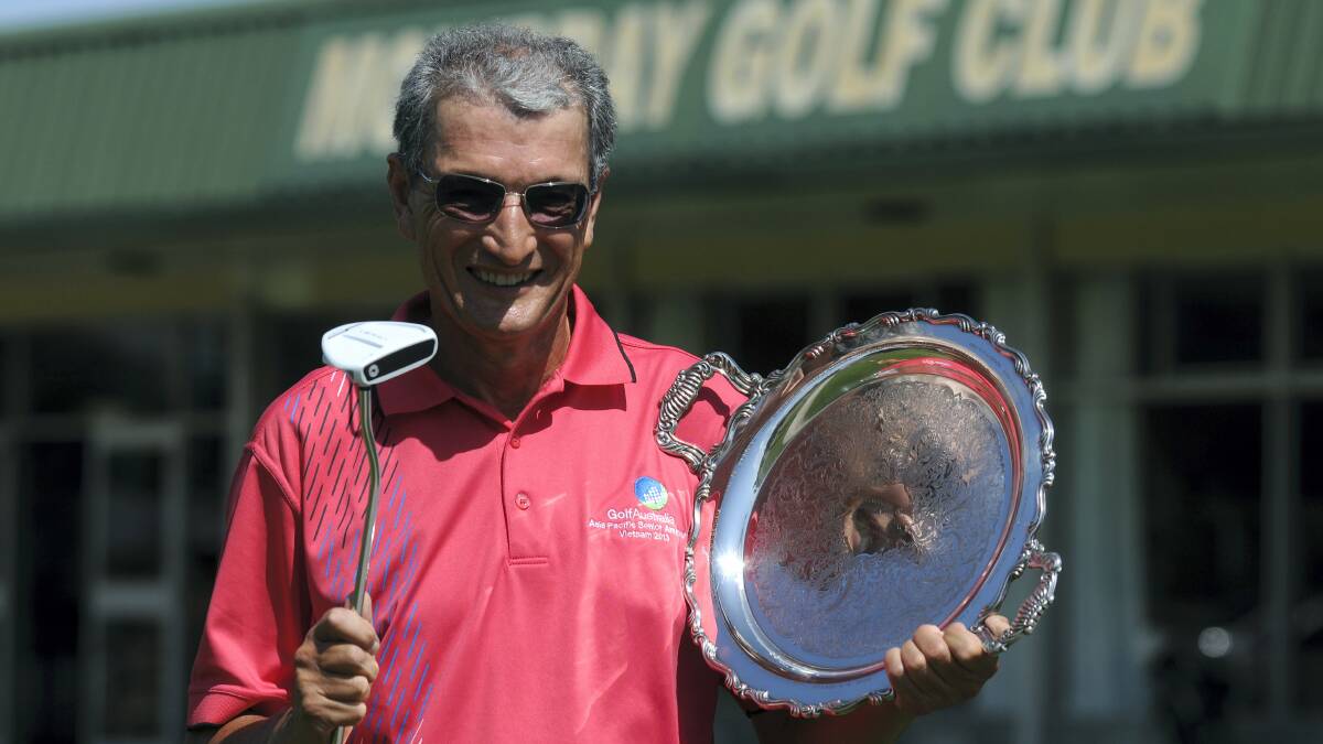 Tasmanian Senior Open championship winner Stefan Albinski,  of  the Mona Vale Golf Club,  celebrates his win yesterday. 