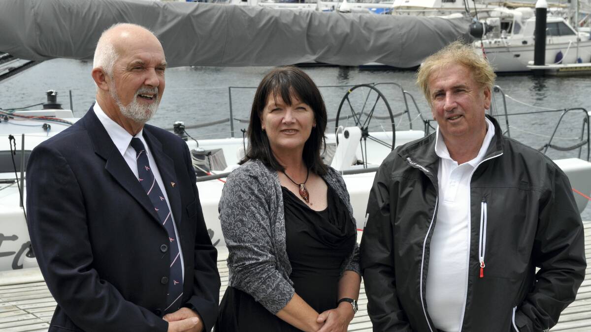 Derwent Sailing Squadron Commodore Ron Bugg with Donela Niles and Fork in the Road skipper Gary Smith at yesterday's launch of the Launceston to Hobart yacht race.  