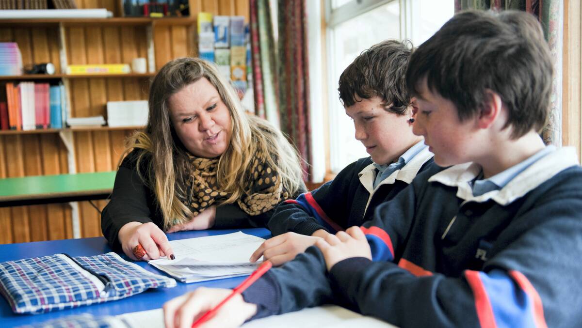 Flinders Island teacher Holly Barnewall with students Brailey Duncan and Zane Bellinger. 