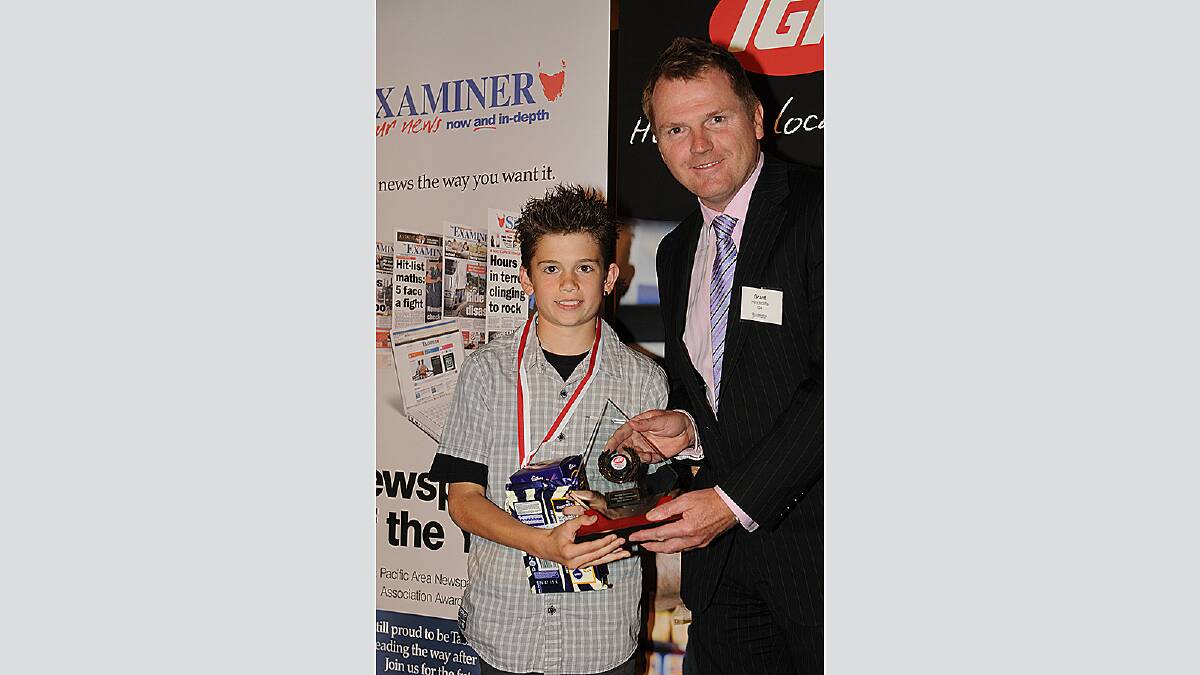 Junior Sports Awards 2012, Country Club: Taekwondo Rising Star Award winner Harley Crawford pictured with IGA Supermarkets Tasmania CEO Grant Hinchcliffe
