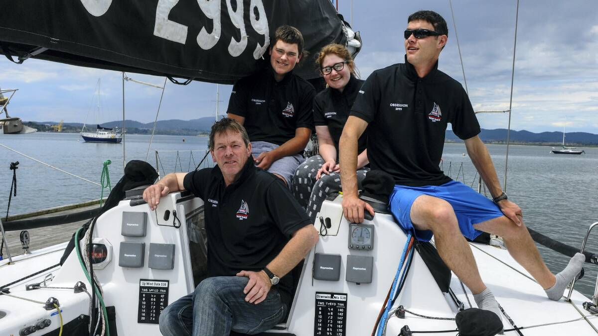 Obsession skipper David Allan and crew Dmitri Allan, Georgia Derrick and Rhys Witt get ready for the Launceston to Hobart race. 