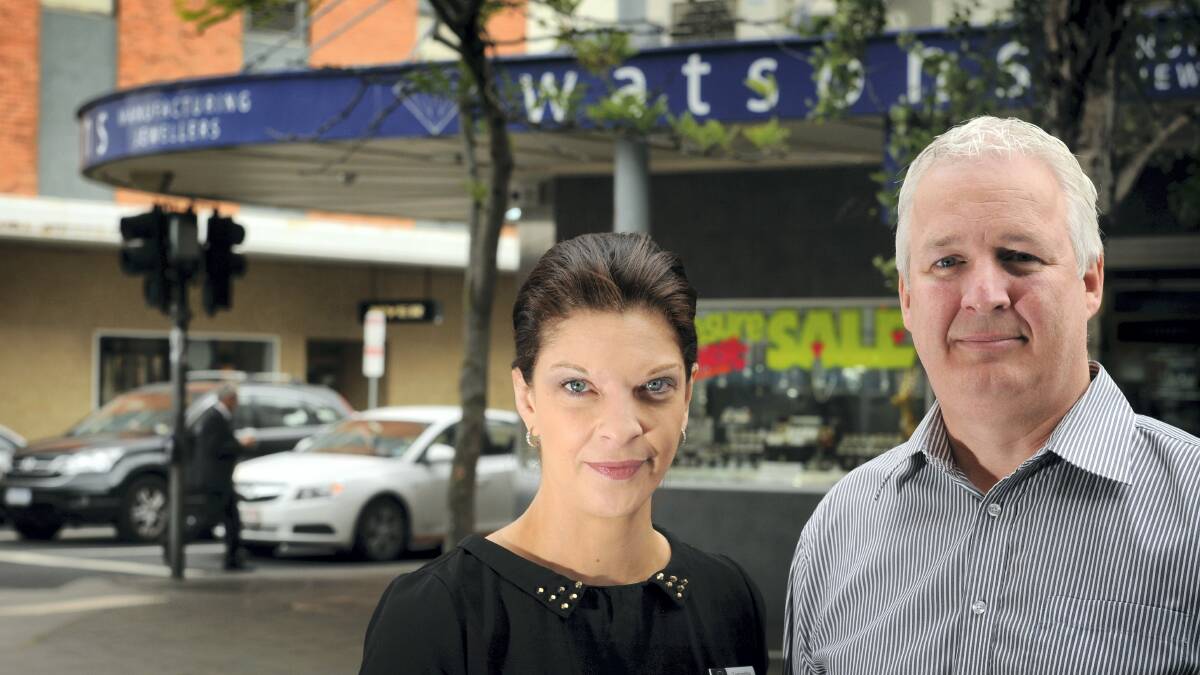  Watson's Showcase Jewellers business manager Samantha Stevens and owner Neil Watson are concerned about people congregating outside their Brisbane Street shop.    