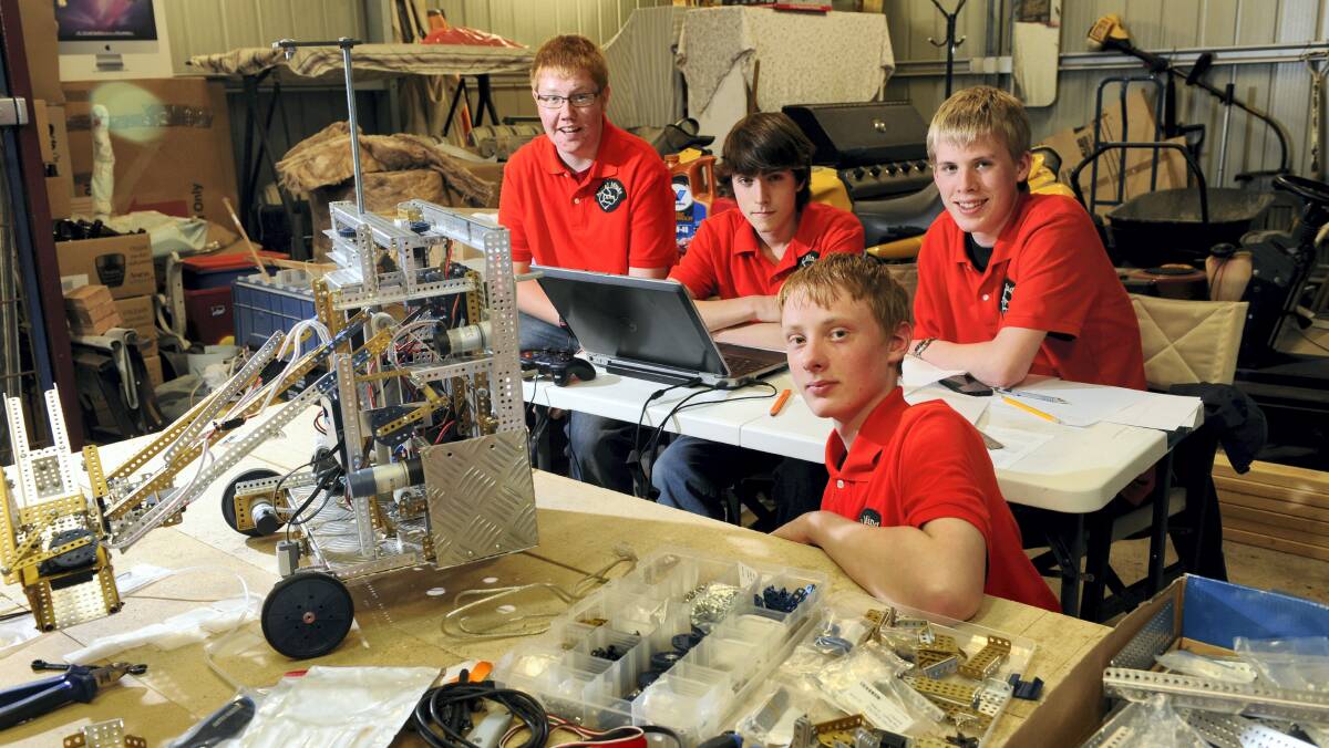 Taking part in the Robot Construction Challenge are Alex Mountney, 18, Damon Ercole, 15, Matthew Pearce, 15, and (front) Harry Heathcote, 15, all part of the Metal Minds Robotics team.