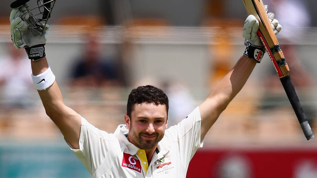 Australia's Ed Cowan celebrates his century during day 4 of the first Test against South Africa at the Gabba yesterday. Picture: GETTY IMAGES