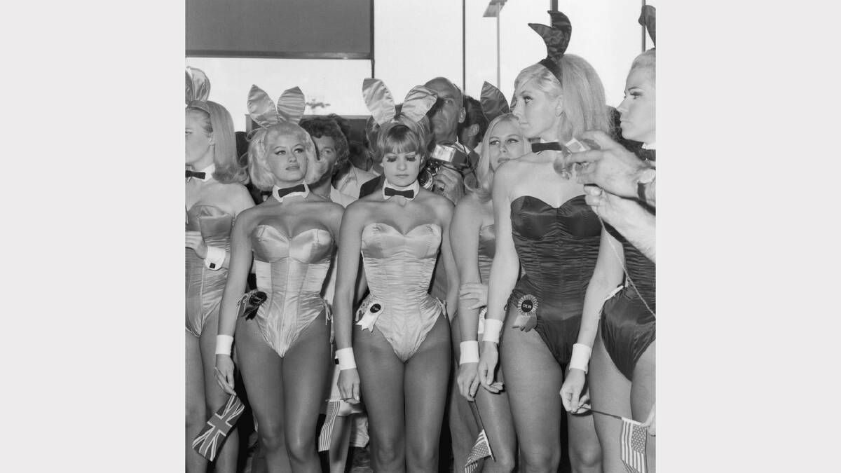 A group of Playboy Bunny Girls from London's Playboy Club waiting for Hugh Hefner, the American owner of the 'Playboy' business empire at London Airport.  