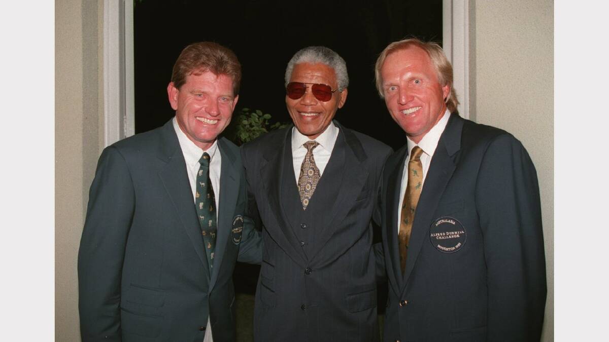 23 FEB 1995:  South African president Nelson mandela (centre) with golfers Nick Price on the left and Greg Norman at a gala dinner to celebrate the inaugural playing of the Alfred Dunhill Challenge between golfers from Southern Africa and Australasia at the Houghton Golf Course, Johannesburg.