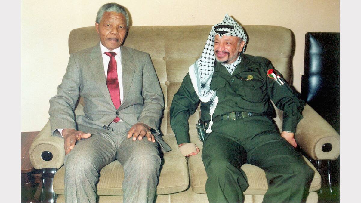In this undated file photo Palestinian leader Yasser Arafat is pictured meeting with Nelson Mandela the former leader of South Africa in Gaza City. Medics announced on October 31, 2004 that Arafat's health is in a serious condition, after the illness that has persisted for two weeks, took a sudden turn for the worse. 