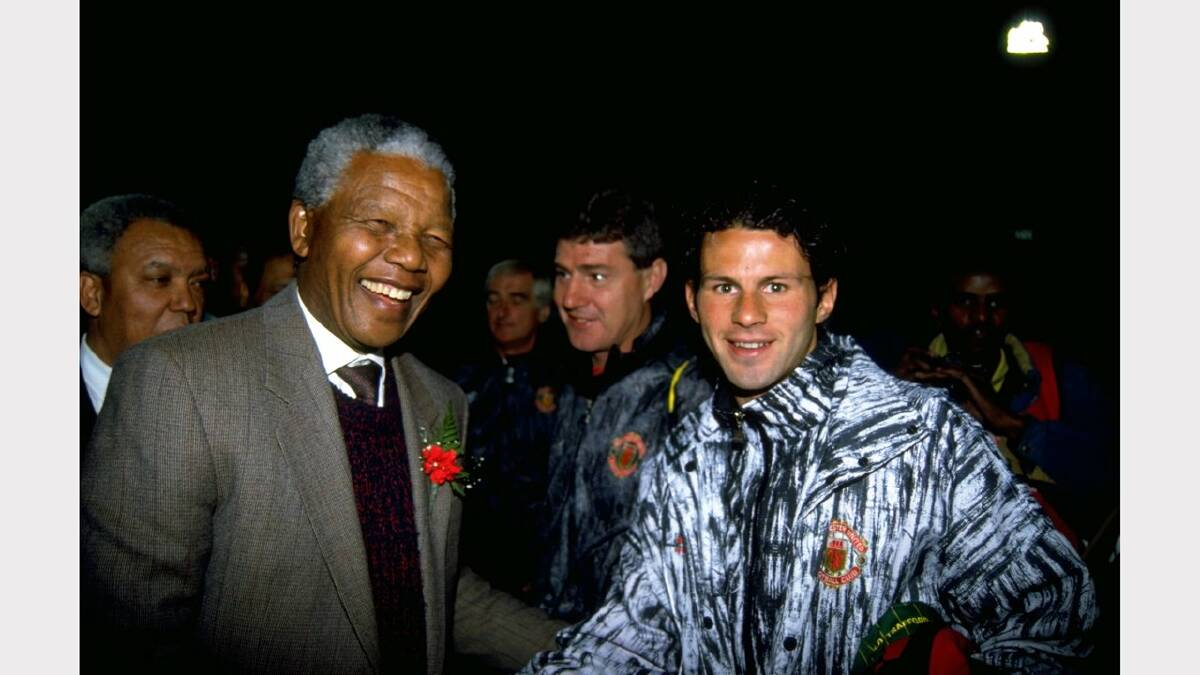 1993:  Ryan Giggs of Manchester United meets Nelson Mandela of South Africa.  Mandatory Credit: David  Rogers/Allsport	