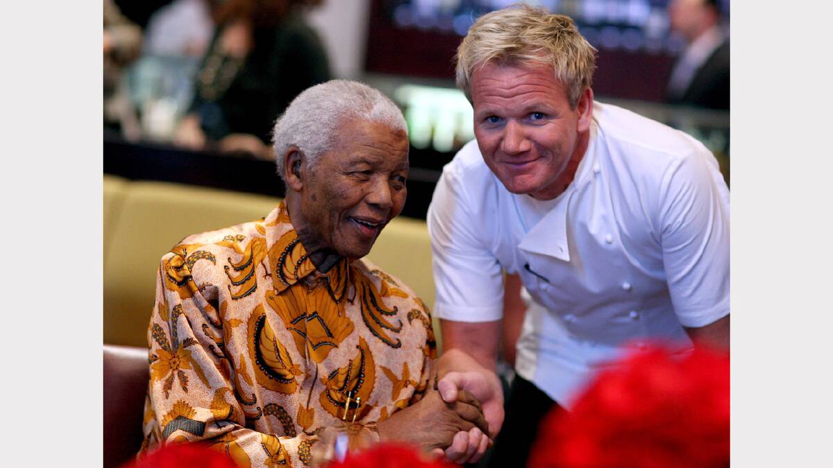Celebrity Chef Gordon Ramsay (R) shakes hands with Nelson Mandela during a lunch to Benefit the Mandela Children's Foundation as part of the celebrations of the opening of the new One&Only Cape Town resort on April 3, 2009 in Cape Town, South Africa. 