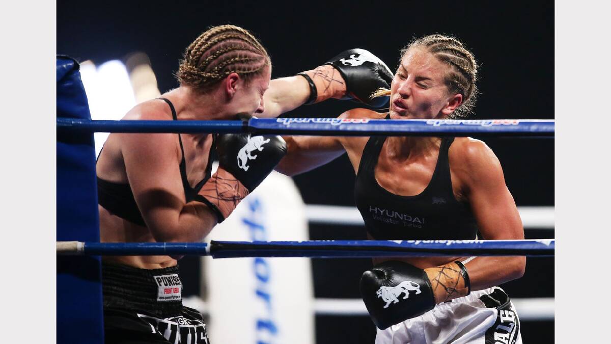  Lauryn Eagle fights Nadine Browne during the Australian Female Lightweight Title bout at Sydney Entertainment Centre.