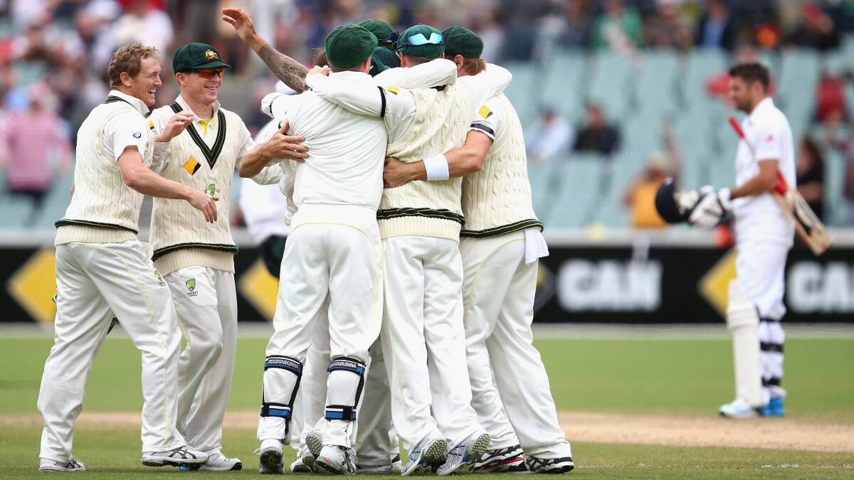 Australia's players celebrate winning today's Test against England. Photo: Getty Images.