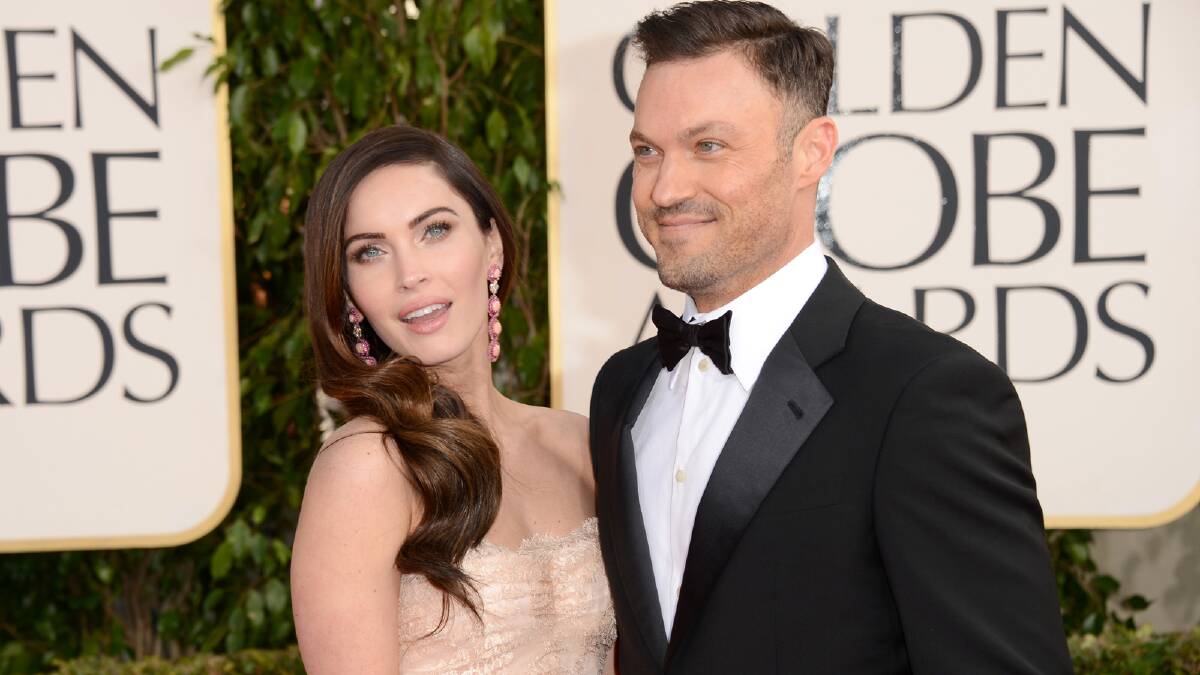 Actress Megan Fox and actor Brian Austin Green arrive at the 70th Annual Golden Globe Awards. Photo by Jason Merritt/Getty Images