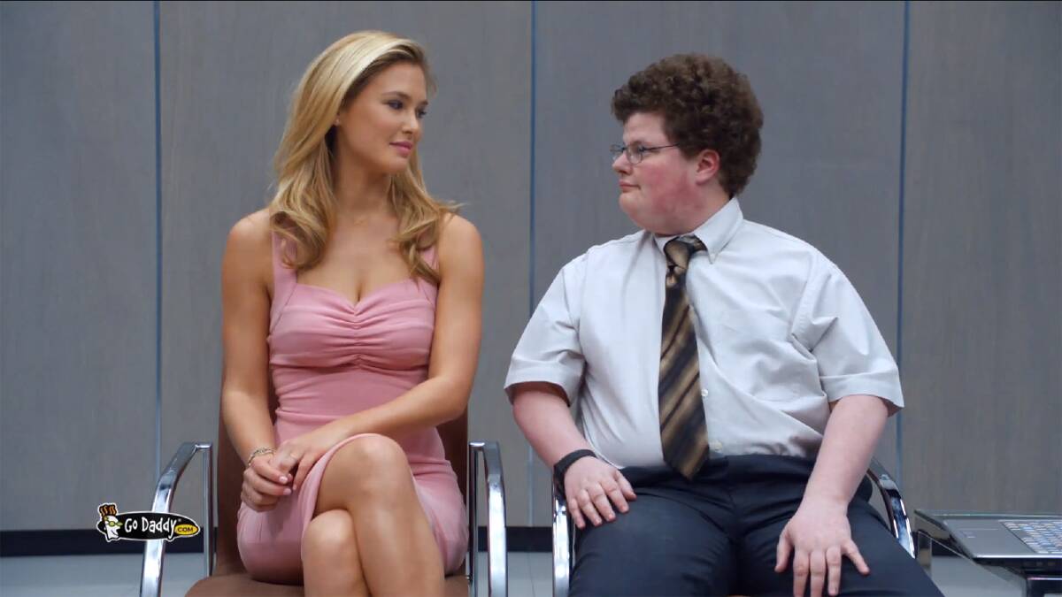 Bar Refaeli makes out with a 'nerd' in the GoDaddy.com Super Bowl commercial.