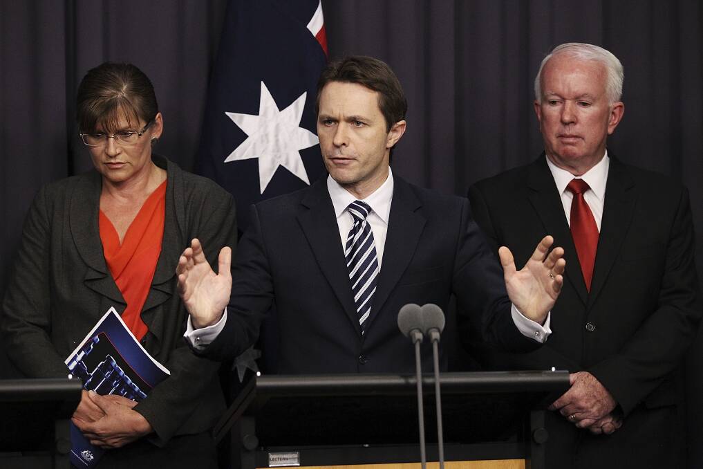  Minister for Justice Jason Clare speaks to media representatives at Parliament House. Photo by Stefan Postles/Getty Images
