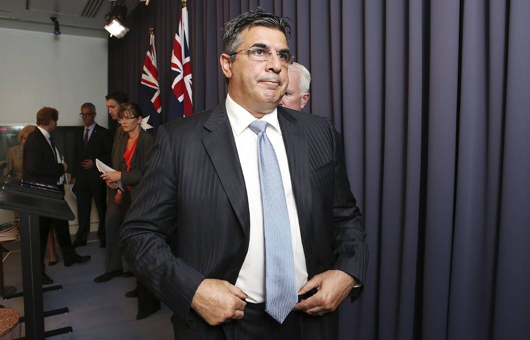 AFL CEO Andrew Demetriou leaves a press conference at Parliament House. Photo by Stefan Postles/Getty Images