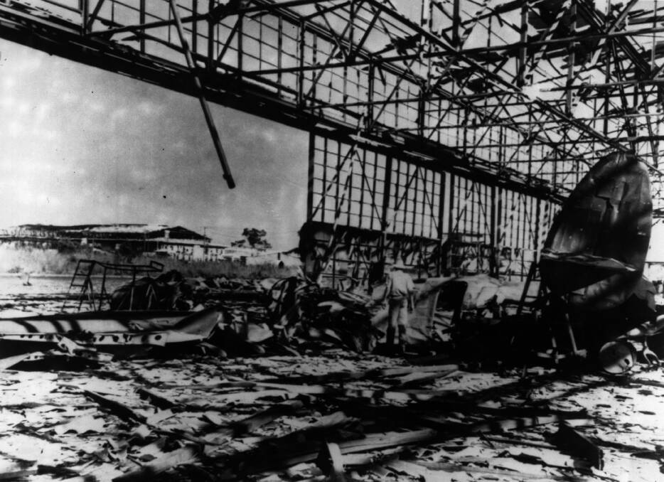 Damage was sustained following the Japanese bombing of Port Darwin. An American Hudson Bomber lies in the ruins of one of the hangars damaged in the raid. Photo by Keystone/Getty Images