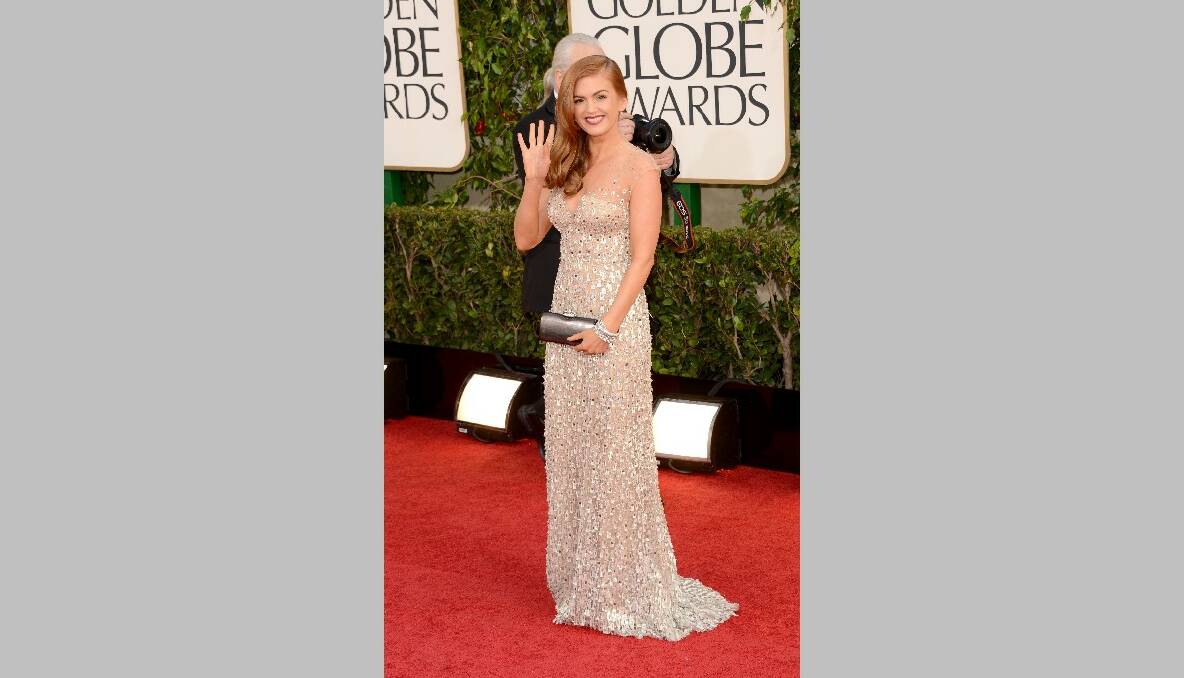 Actress Isla Fisher arrives at the 70th Annual Golden Globe Awards. Photo by Jason Merritt/Getty Images