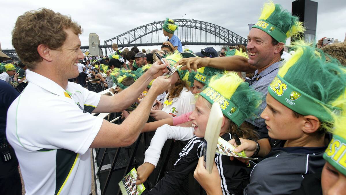 Tasmanian George Bailey signs autographs for fans during Ashes victory celebrations for the Australian team at the Sydney Opera House.  Picture: FAIRFAX MEDIA