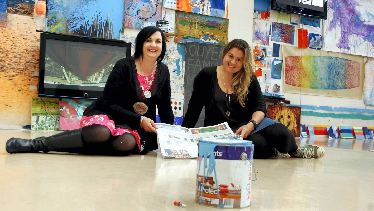  Launceston City Council youth officer Wendy Newton and Sawtooth director Marisa Molin in the space where the Off the Walls finalists will exhibit their work. The space at Sawtooth features Henry Jock Waler's Oil on Hiace (Henry's mobile studio) work.
