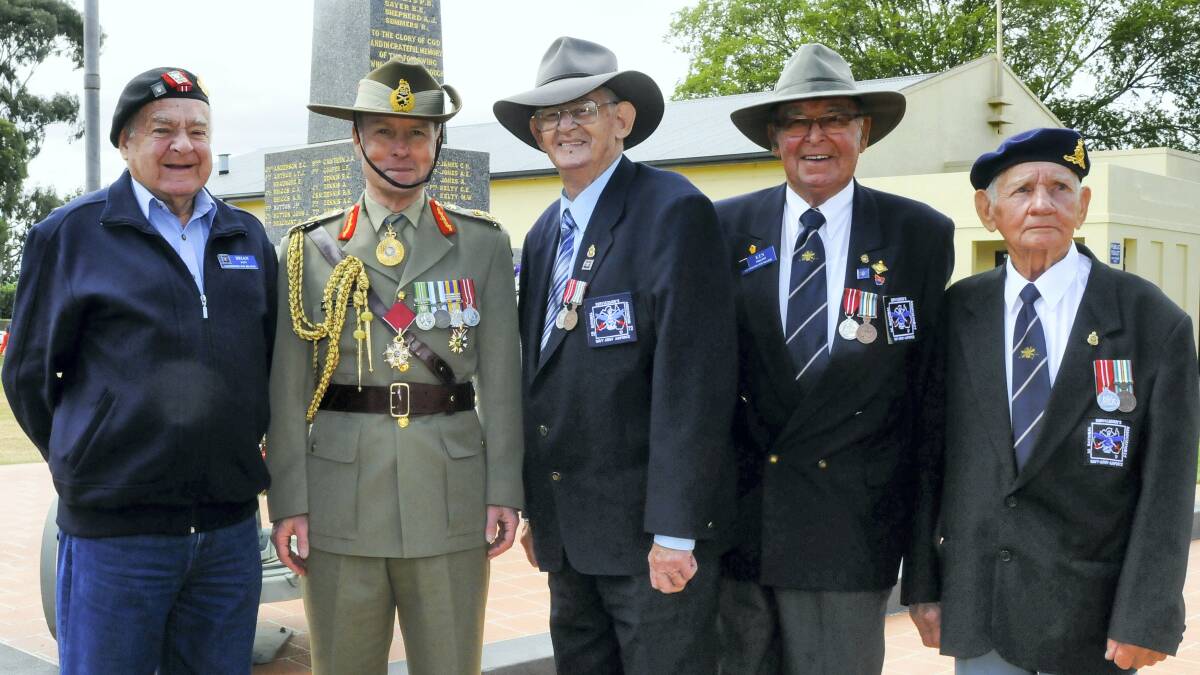 Lieutenant-General David Morrison, second from left, with former national servicemen Brian Pitt, Merv Barker, Ken Philpot and Ric Wood, all of Launceston, at Longford yesterday.