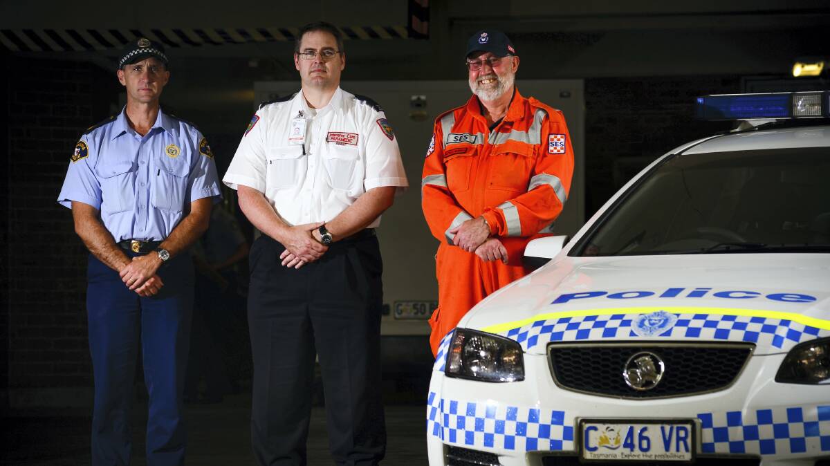 Tasmania Police Sergeant Nick Clark, intensive care paramedic David Thomas and West Tamar SES unit manager Patrick McBride are on the front line for road accidents. Picture: PHILLIP BIGGS