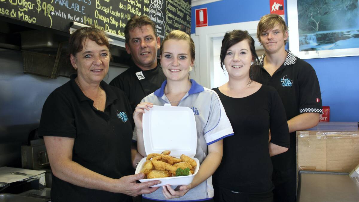 Chef's Catch owners Cindy and Roger Bean and staff Chelsea Hinds, Carli Gooding and Mitchell Stuber with a serve of their fish and chips.