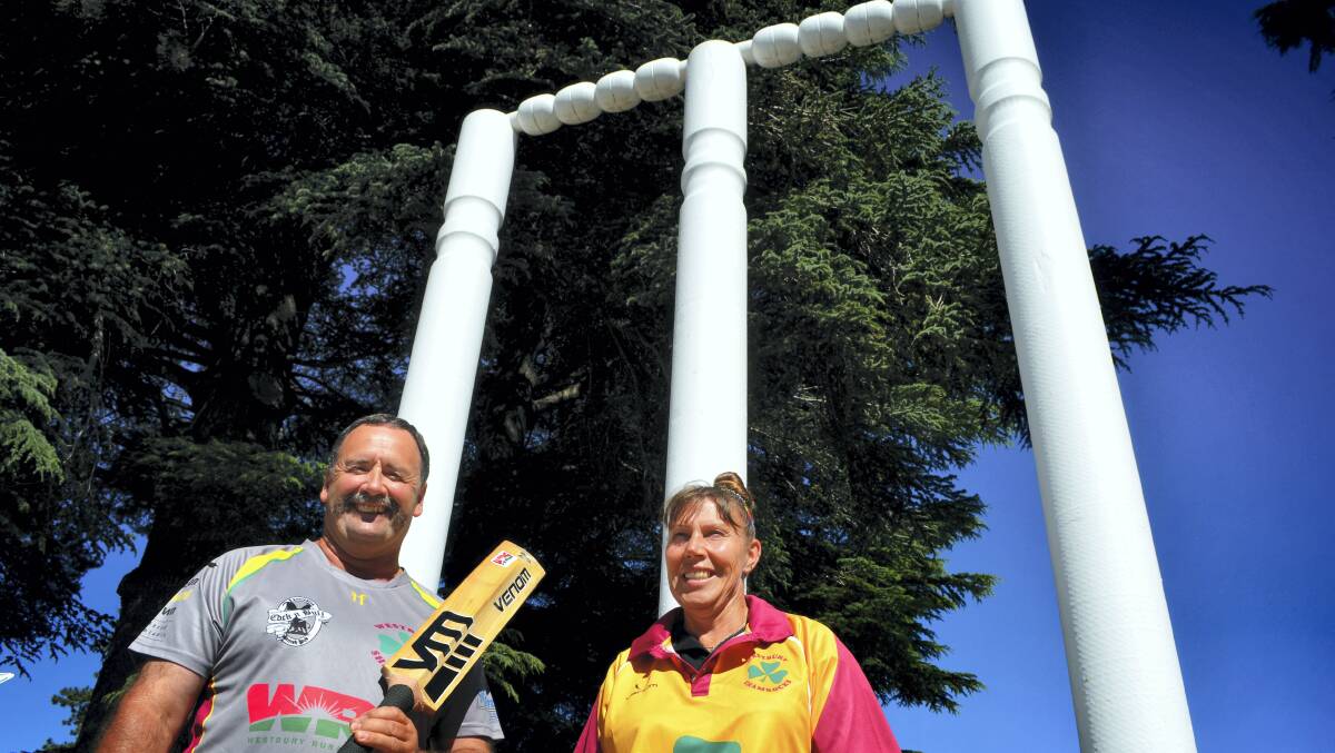 Westbury Cricket Club's Michael and Gale Claxton with the town's iconic wickets.