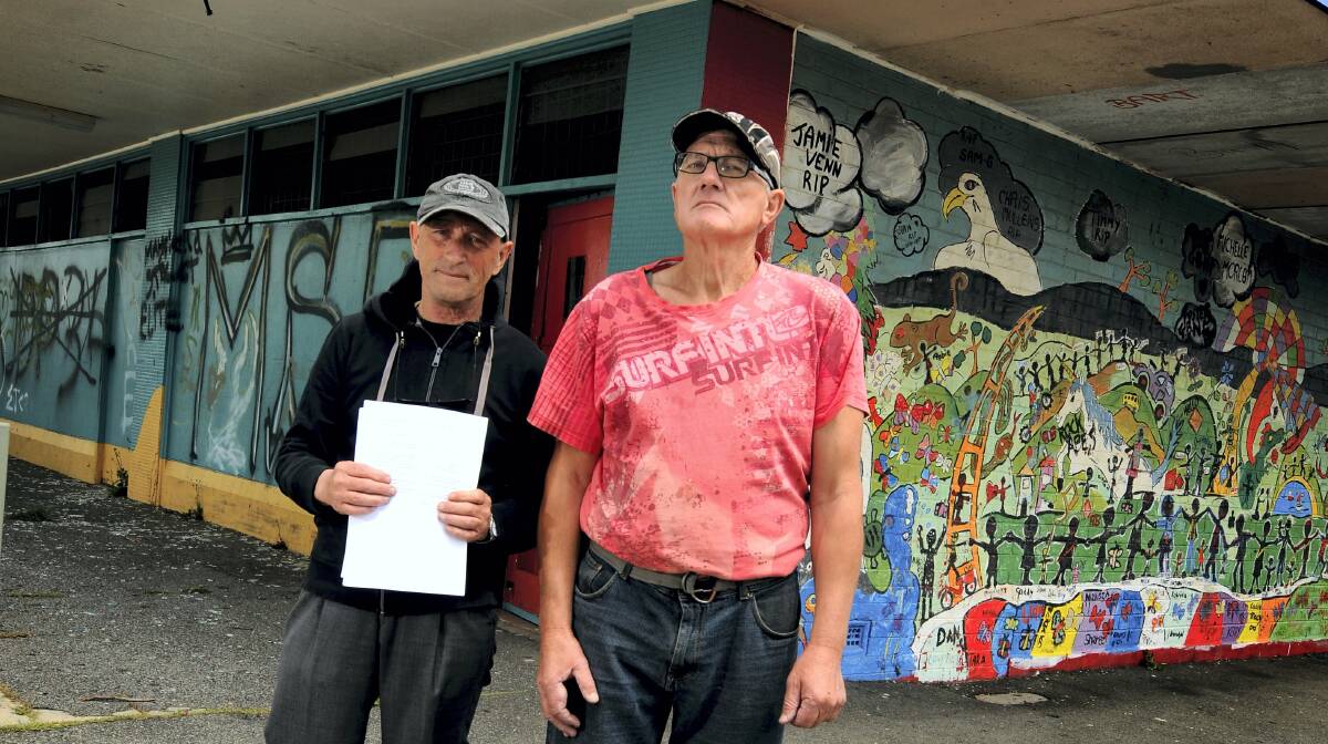 Mayfield residents David Brimble and Gary Cadman outside the suburb's old shopping centre. Picture: GEOFF ROBSON