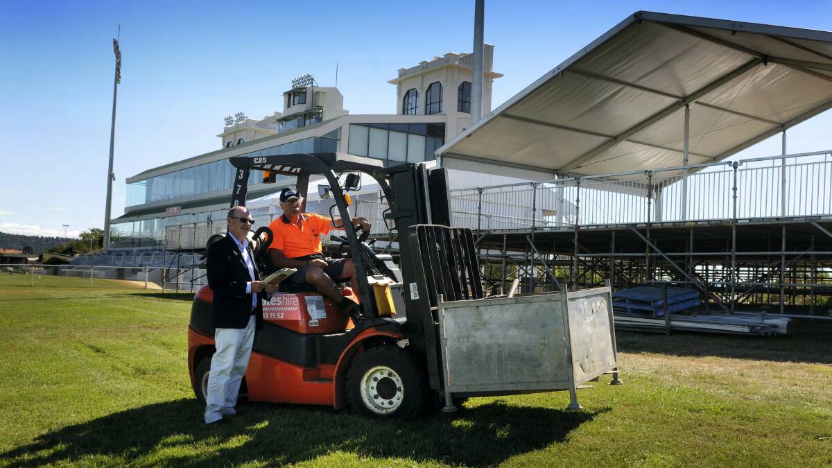 Tasmanian Turf Club chief executive Robert Biffin and site and safety manager Barrie McIndoe check on the preparations for next Wednesday's Launceston Cup. Picture: PAUL SCAMBLER