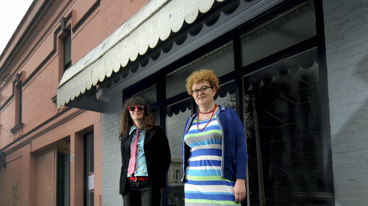 Pop Up Launceston founders Karen Revie and Kitty Taylor outside one of the city's vacant shops.  Picture: GEOFF ROBSON
