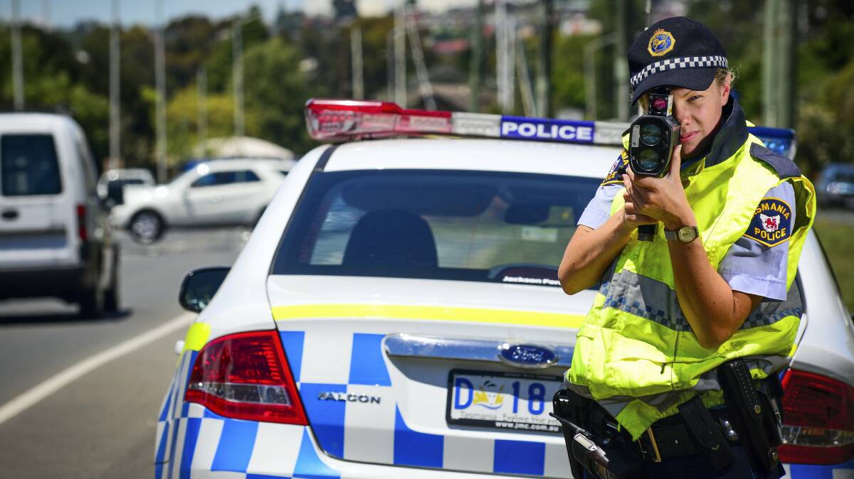 Constable Kristin Groves checks speed on West Tamar Road, Trevallyn, as part of Operation Crossroads. Picture: PHILLIP BIGGS