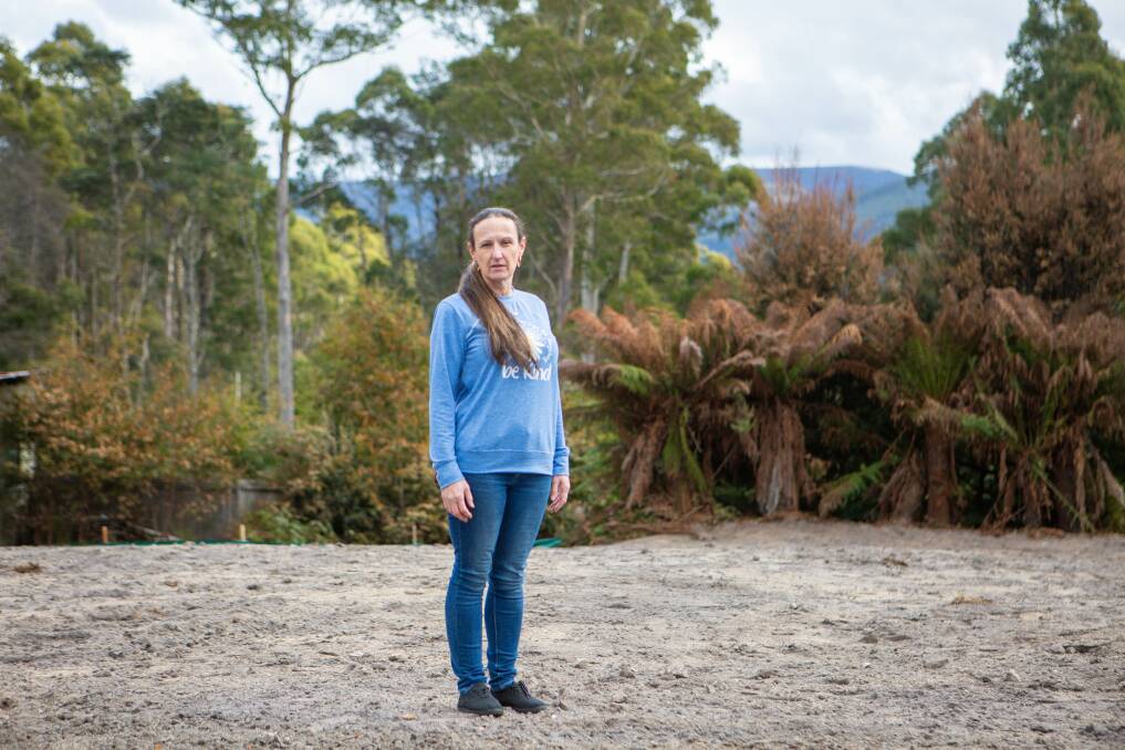 GUTTED: Caroline Readhead, owner of Cradle Forest Inn, looks out at the damage done by the fire. Picture: Eve Woodhouse