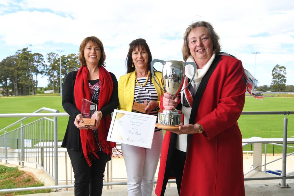 SMALL BUT MIGHTY: King Island residents Heidi Weitjens, Audrey Hamer and mayor Julie Arnold were overwhelmed by the accolades. Picture: Brodie Weeding