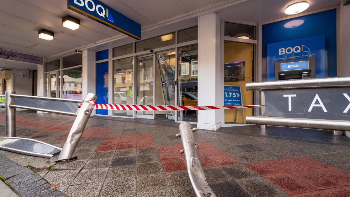CRASH: Bank of Queensland Launceston branch's front door damage from a car crash on Sunday morning. Picture: Phillip Biggs
