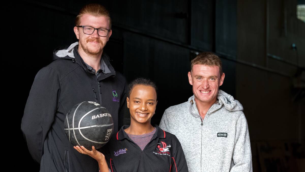 CHALLENGE: Support workers such as Hugh King from Optimal Optimal Community Support Services call for YMCA funding to help participants like Ebony Dingemanse and Ryan Herilihy. Picture: Phillip Biggs
