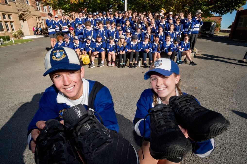 POWER WALK: Launceston Grammar grade 12 captains George Calvert, 17 and Grace Robertson, 18 with their cohort gearing up for the walkathon. Picture: Phillip Biggs