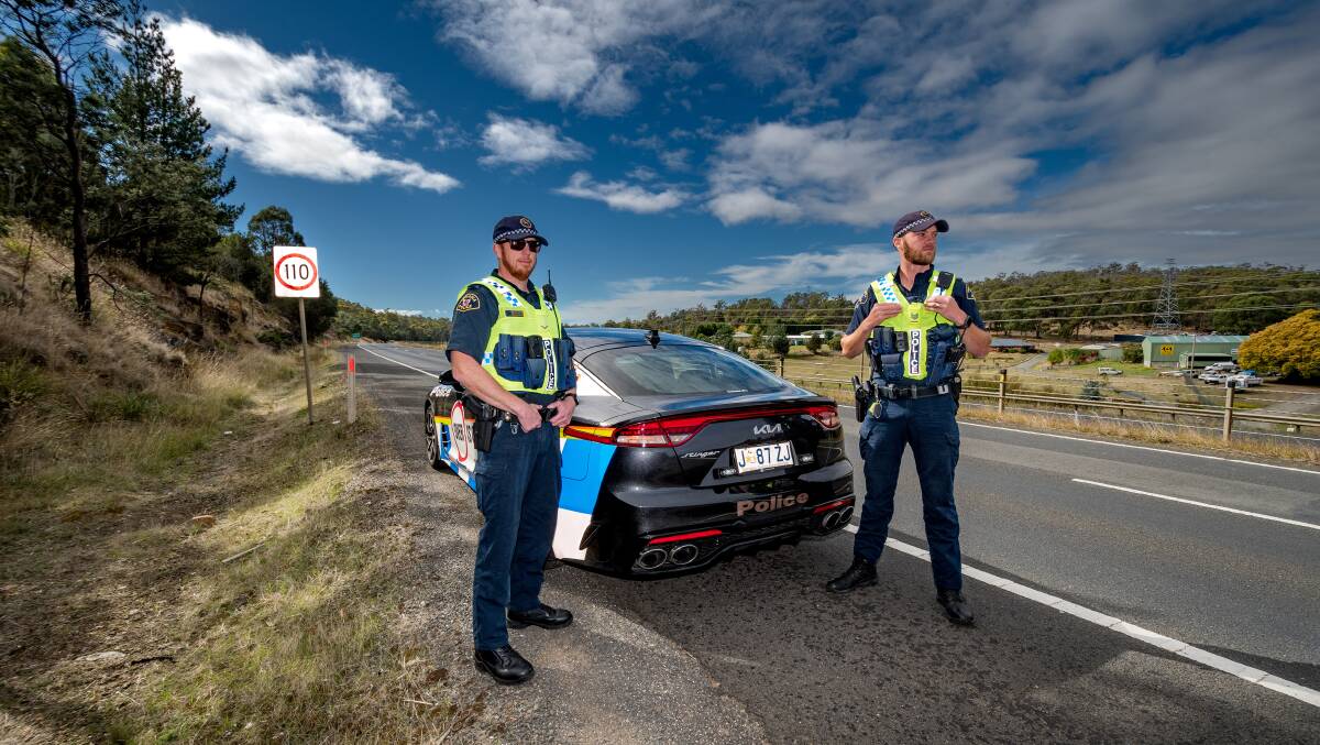 SAFETY: Acting Sergeant Ben Grenda and Constable Daniel Hortle beside the Bass Highway ahead of Operation Safe Arrival. Picture: Phillip Biggs