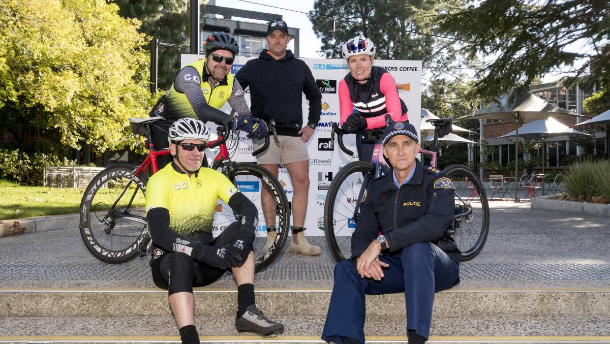 RIDE ON: Police Charity riders Darren Cook and Senior Sergeant Nick Clark (front left and right), Donald Lehner, Matt Challis, Meghann Reitsema ahead of the one-day ride. Picture: Phillip Biggs