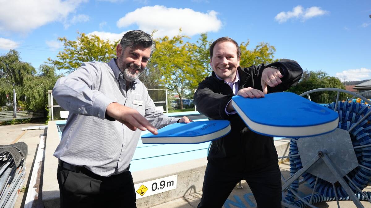 City of Launceston acting manager business enterprises Justin Dale and mayor Danny Gibson overseeing preparations at the Lilydale pool. Picture supplies. 