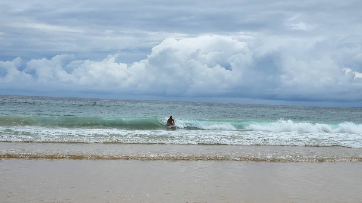 South Coast surfer Bill Ballard said after he'd been warned about the shark he'd started paddling like crazy and caught the next wave in. Photo: Amandine Ahrens