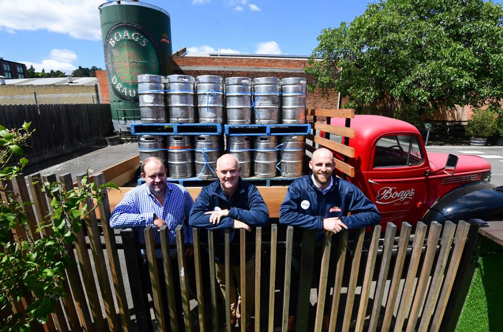 Tasmanian Hospitality chief executive Steve Old flanked by Boag's brewery manager Nathan Calman and state sales manager John Burchill. File picture