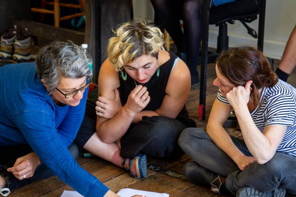 The Motherload co-creators Melissa King and Bryony Geeves work with guest artist Jane Johnson in creative development stages. Picture by Rebecca Thomson