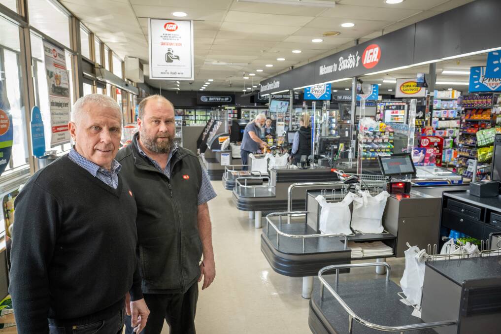 David Baxter and his son, Jarrod Baxter share the same philosophy about customer service at the checkout. Picture by Paul Scambler 