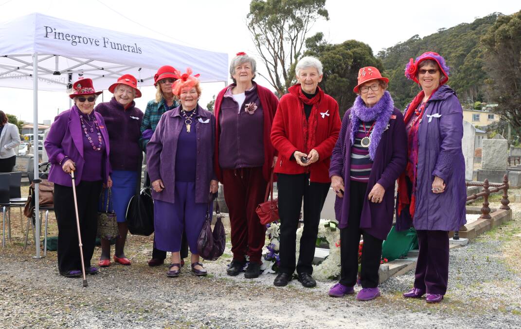 EQUALITY: Hatters To Go members Nan Sharman, Patty Frankcombe, Renate Langer, Elizabeth Singleton, Judith Lake, Pam Thorne, Joan Lean and Merlene Button in front of Jessie Spinks Rooke's grave. Picture: Molly Appleton